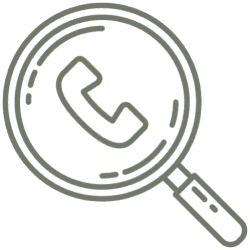 Magnifying glass focusing on a phone icon symbolizing call search.
