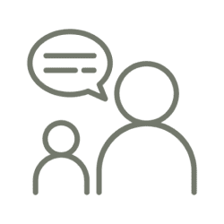 Two people communicating with speech bubbles above them.